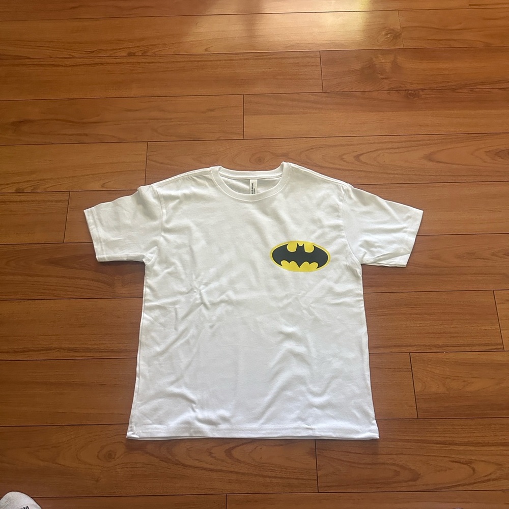 Bella Canvas Batman White Kids Tee with Bat signal Logo and Batman on the Back.